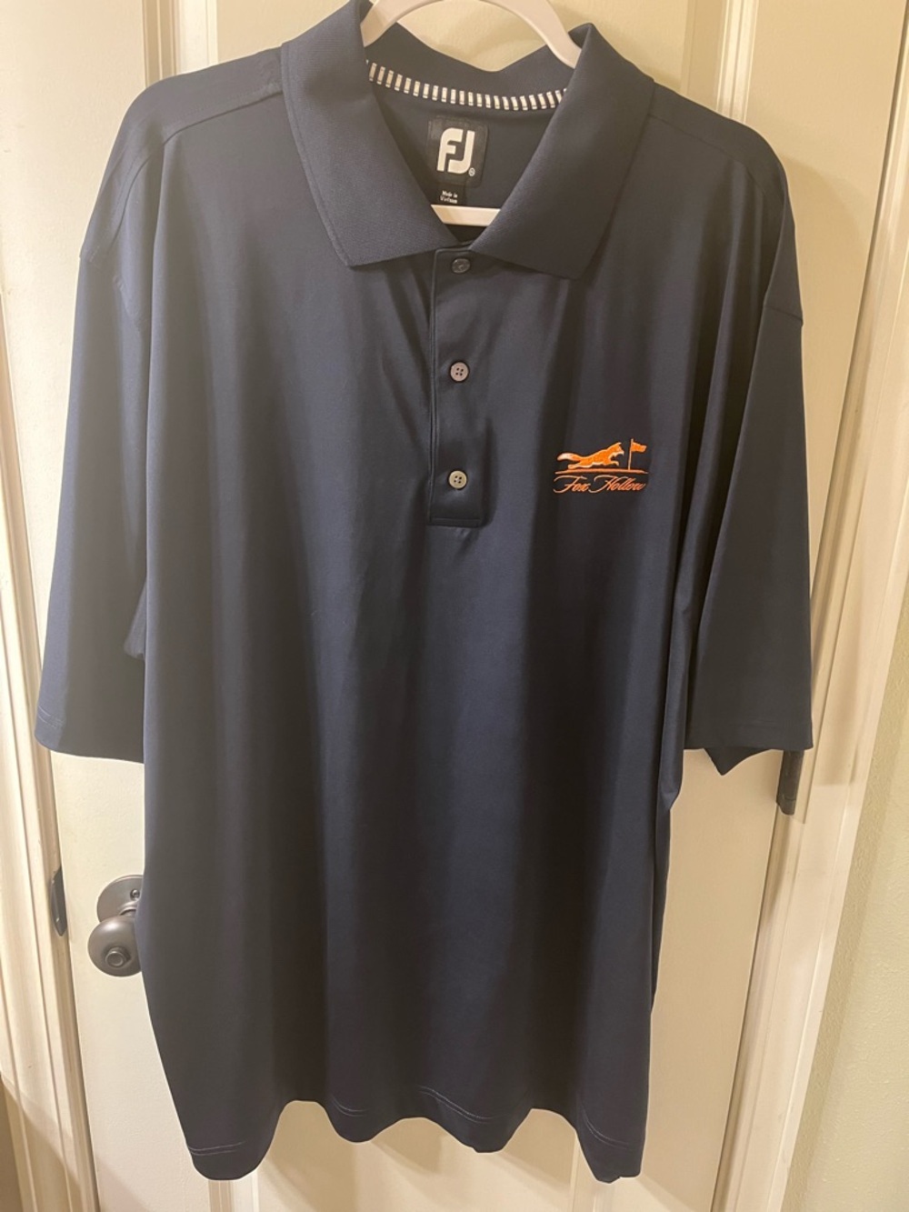FootJoy Navy Polo with Orange Fox Hollow Logo